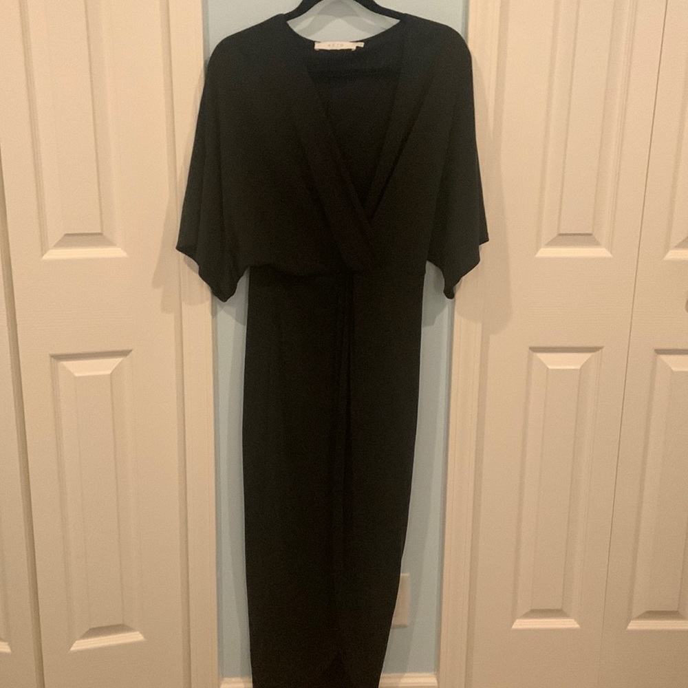 Never worn! Gorgeous! High slit up front.